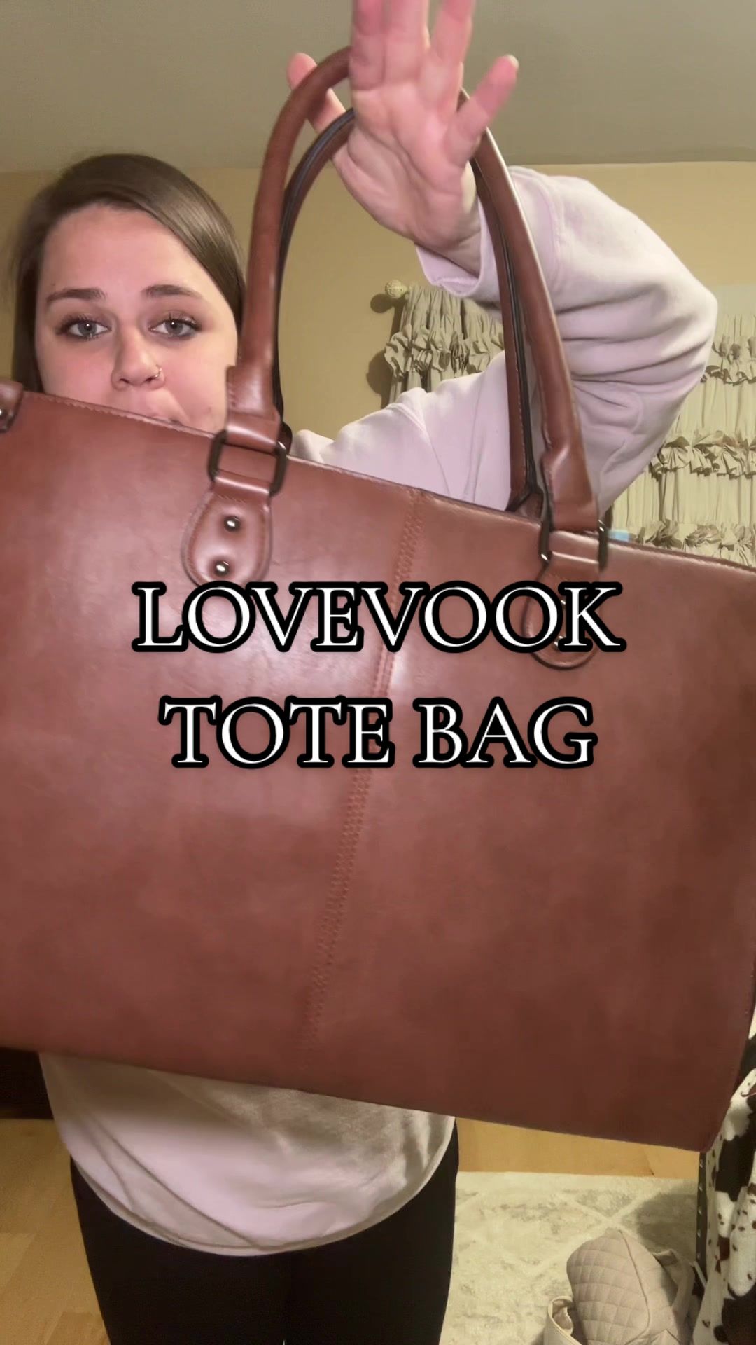 TikTok post by @akerspartyof6 for Lovevook. Caption reads: You don’t want to miss out on this @Lovevook Bags....