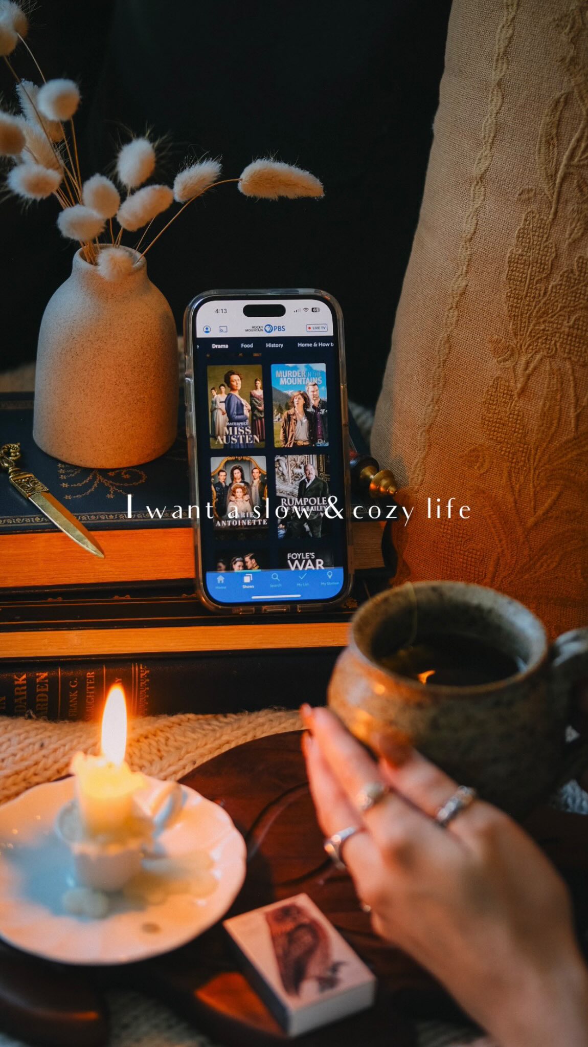 Instagram post by @cosyacademia for PBS. Caption reads: [...] reading nook, hot tea in hand, and a good....