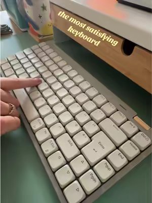 TikTok post by @sleepylittlesloth for Lofree. Caption reads: [...] keyboard, listen to that sound 😍😍....