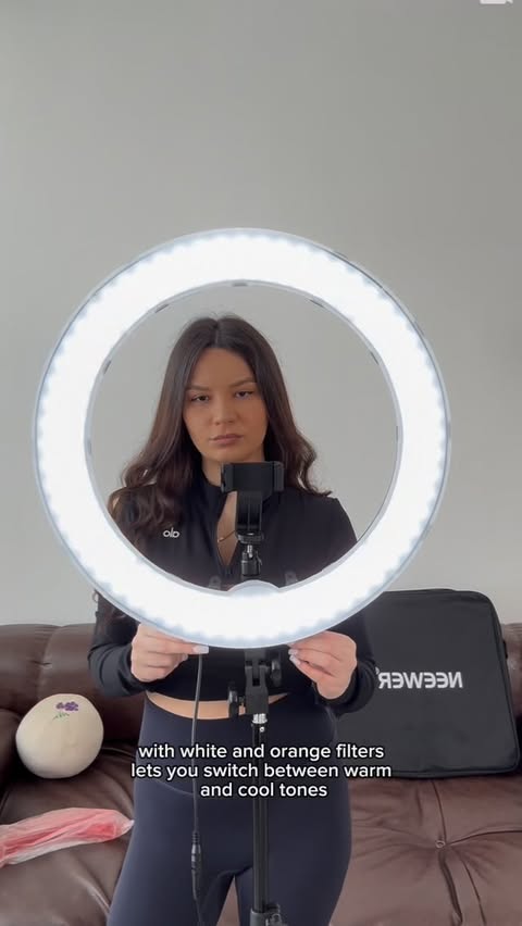Instagram post by @tatiaarveladze for NEEWER. Caption reads: ✨ @neewer RL-18 18” 55W Ring Light Clean light.....