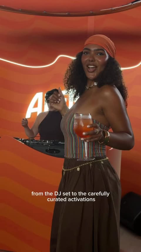 Instagram post by @amber.cristinaa for Aperol Spritz. Caption reads: [...] of dancing, laughter and vibes with....