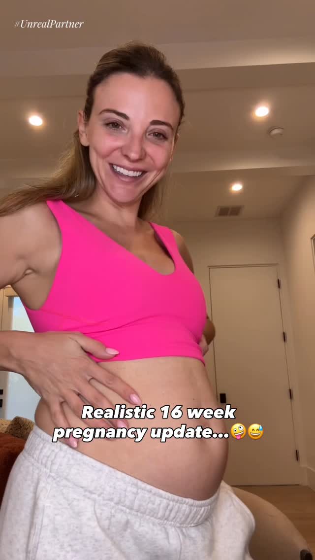 Instagram post by @daniaustin for UNREAL Snacks. Caption reads: 16 weeks of carrying this little bebe 👶🏼 can’t....