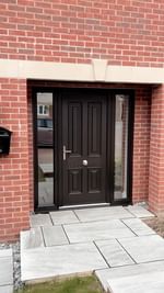 Instagram post by @littlehomecomforts for The Palladio Door Collection. Caption reads: Throwback to our front door glow up 🫶🏼

Been....