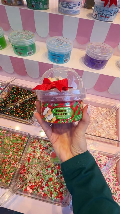 Instagram post by @lacyinthepark for Kawaii Slime Company. Caption reads: Stretching out pure holiday magic at....