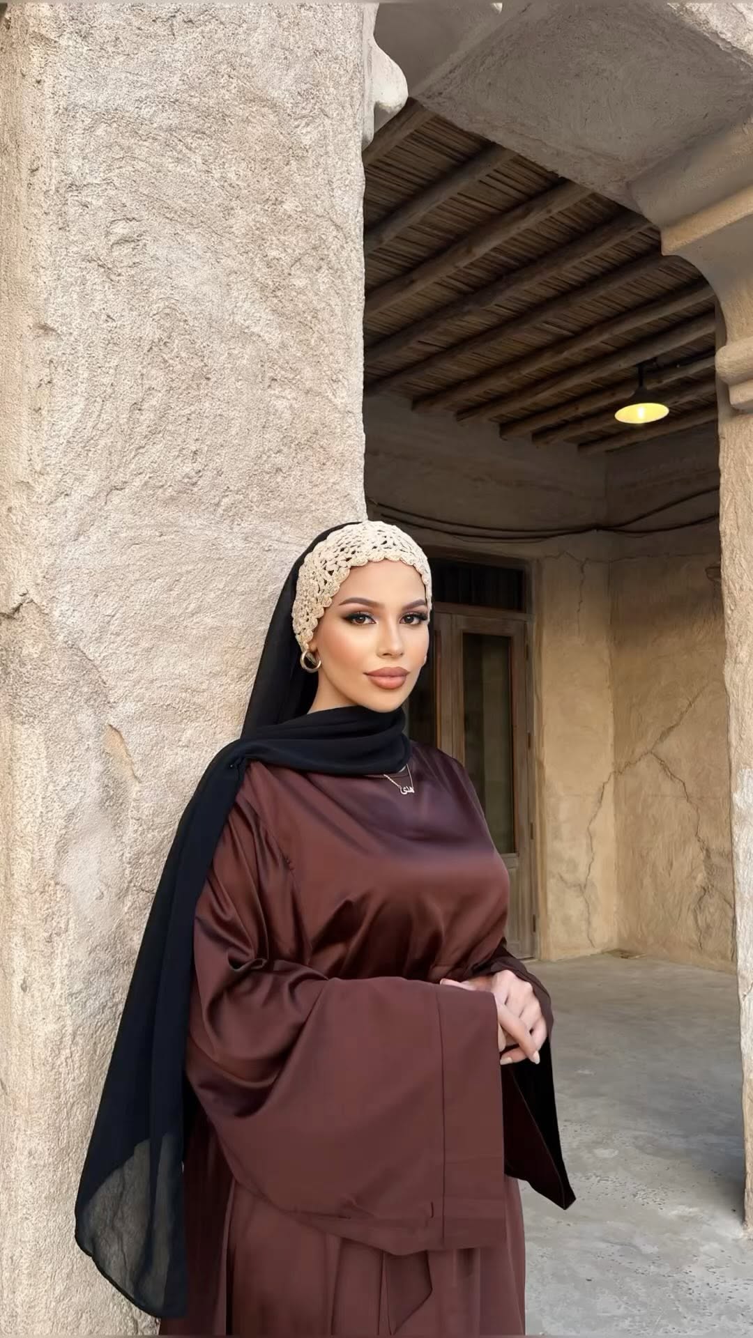 Instagram post by @houda.abdelal for Fajr Noor. Caption reads: [...] beautiful satin abaya and jewelry from....