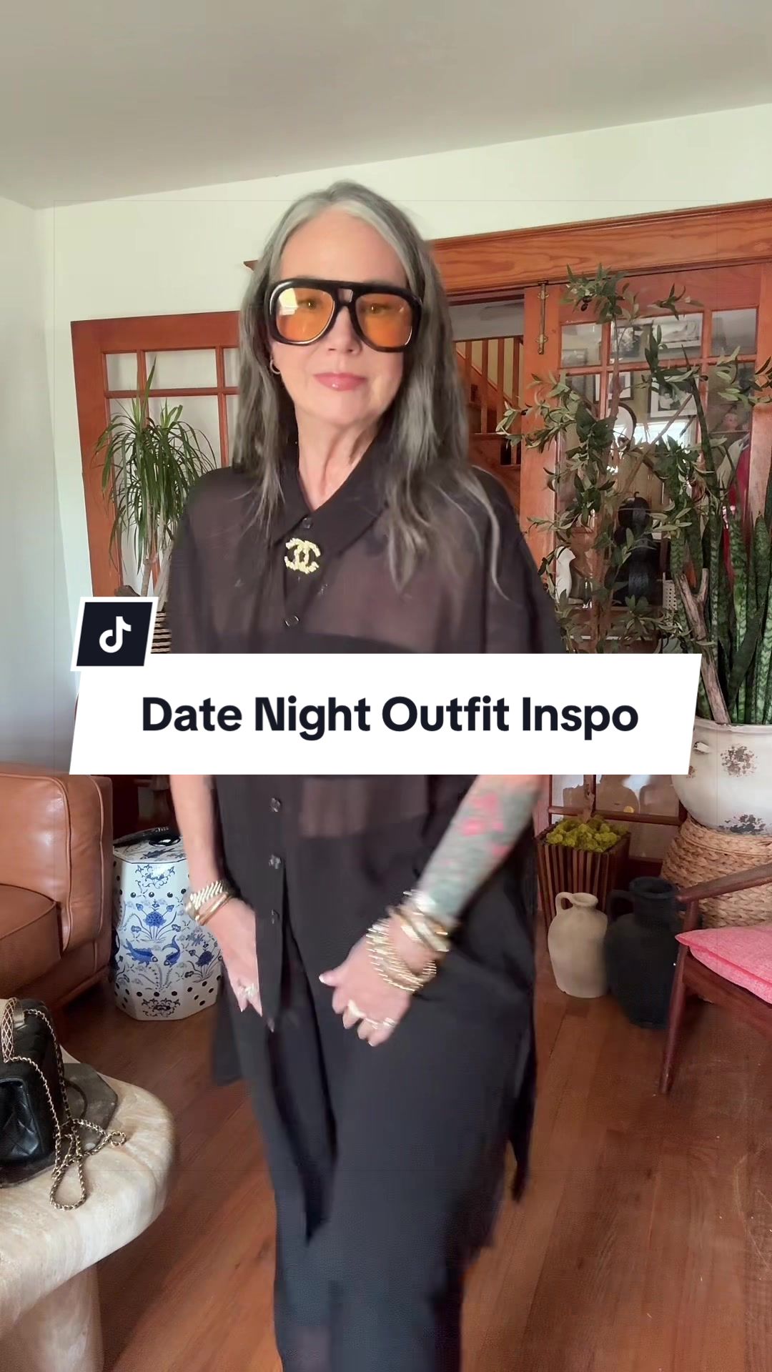 TikTok post by @aestheticaleestyles for DEZI. Caption reads: [...] coverup / top over bandeau top Add some....
