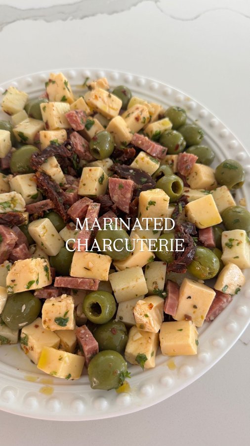 Instagram post by @convinoboard for Mezzetta. Caption reads: Not your average charcuterie 🧀🥓🫒

This....