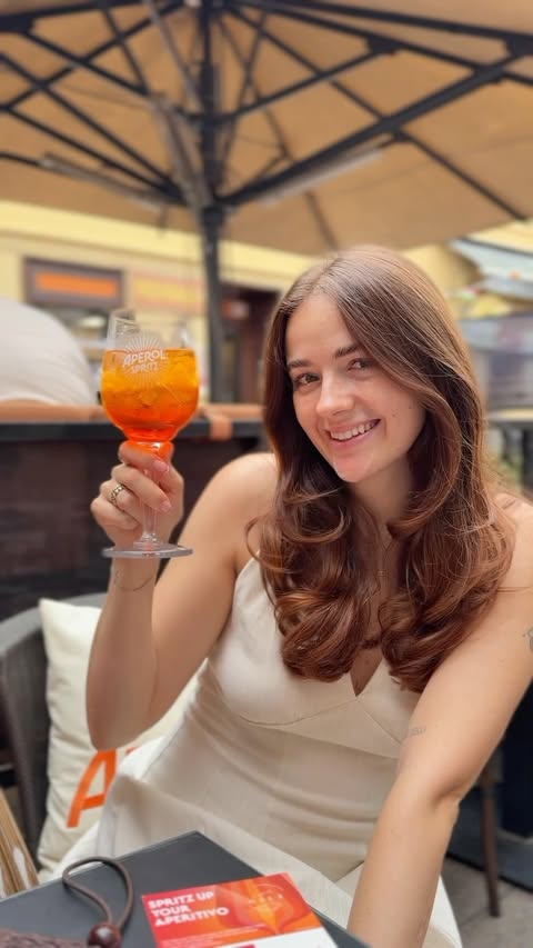Instagram post by @pepyyyyy.y for Aperol Spritz. Caption reads: [...] u Milanu? Jesam. sue me!!!! 🍹....