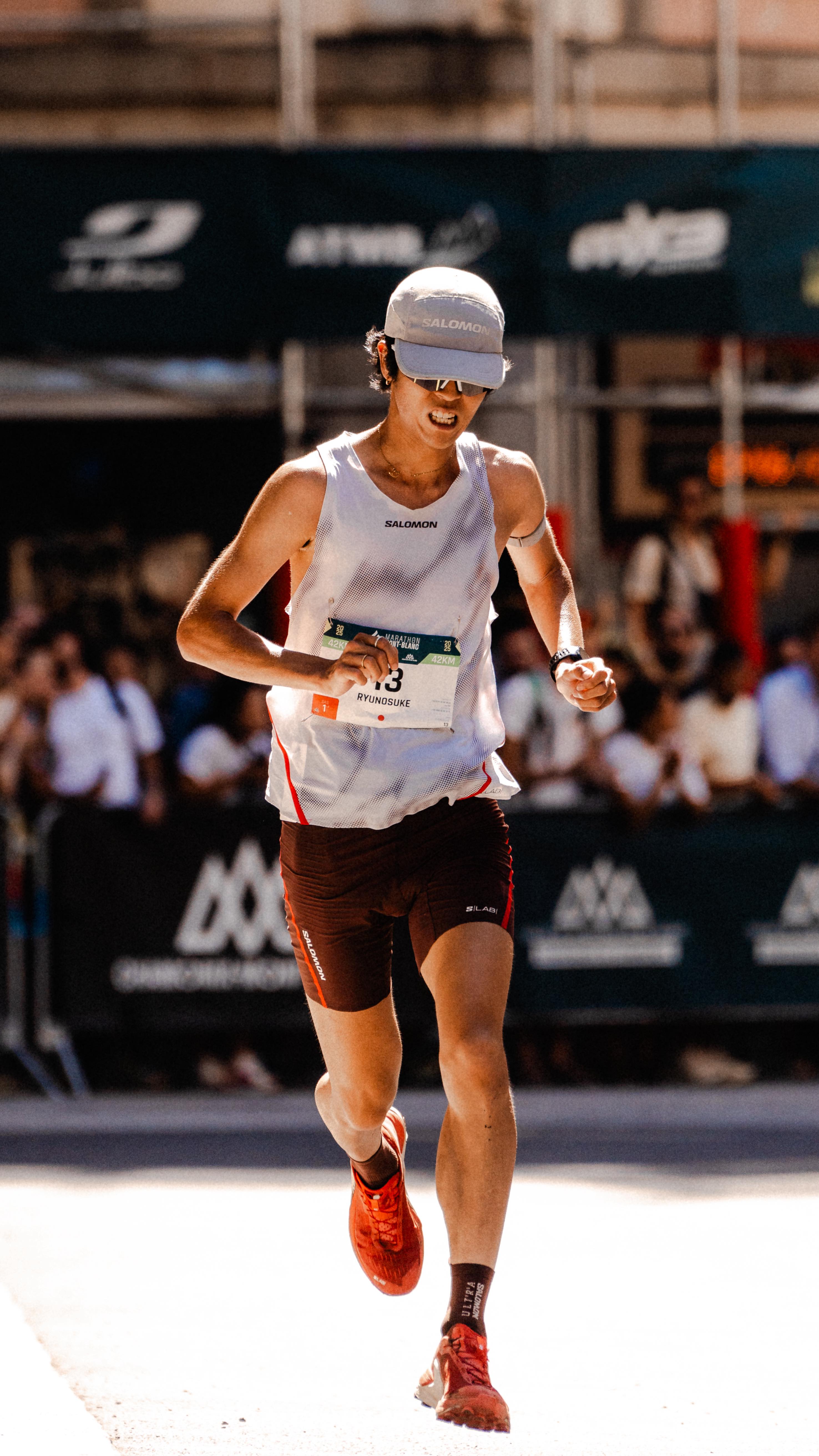 Instagram post by @ryunosuke_omi for COROS. Caption reads: [...] by @salomon @salomonrunning @corosglobal....