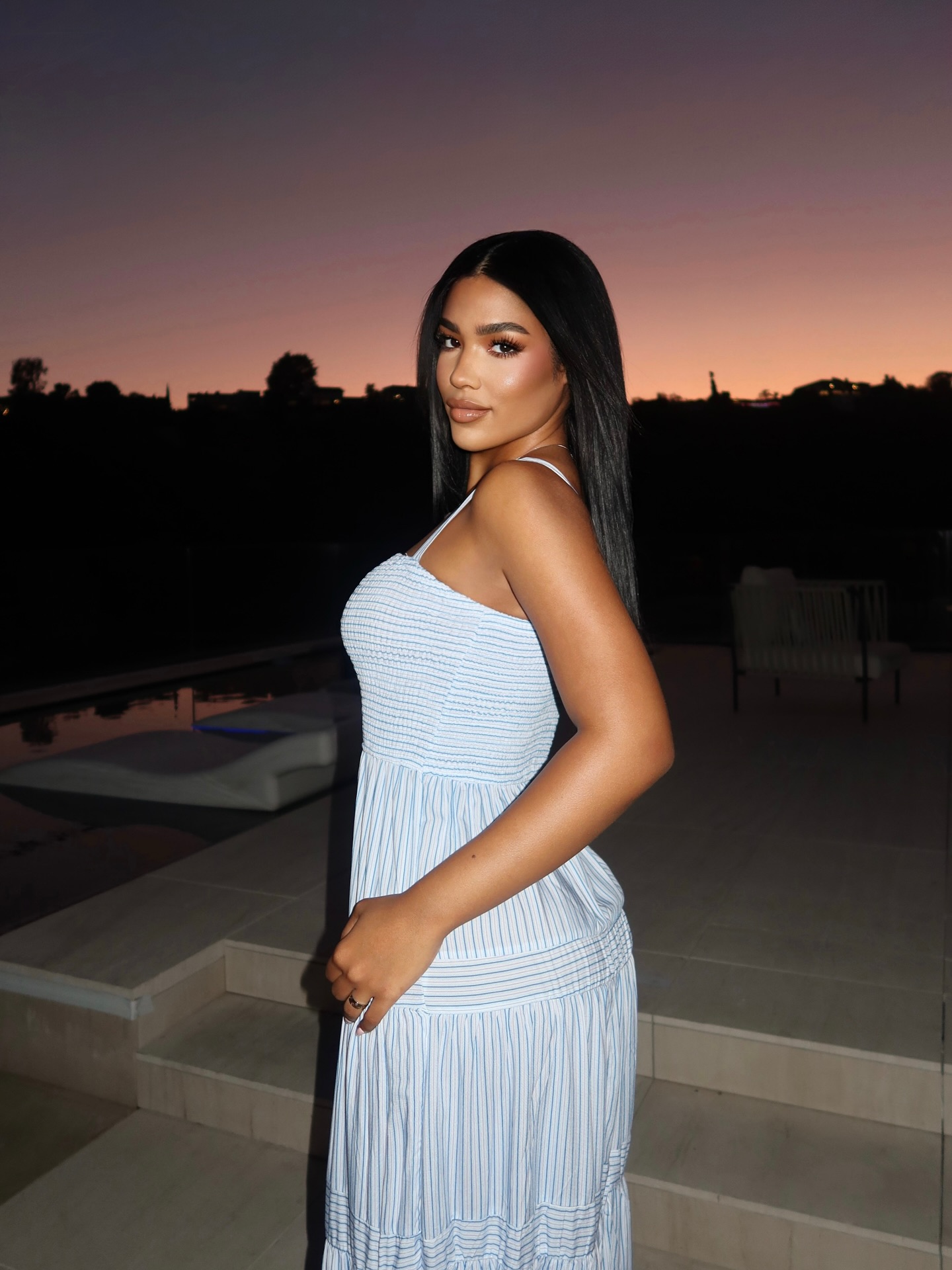 Instagram post by @andreinasntos for Rainbow Shops. Caption reads: pastel hour 💫

@rainbowshops #ad.