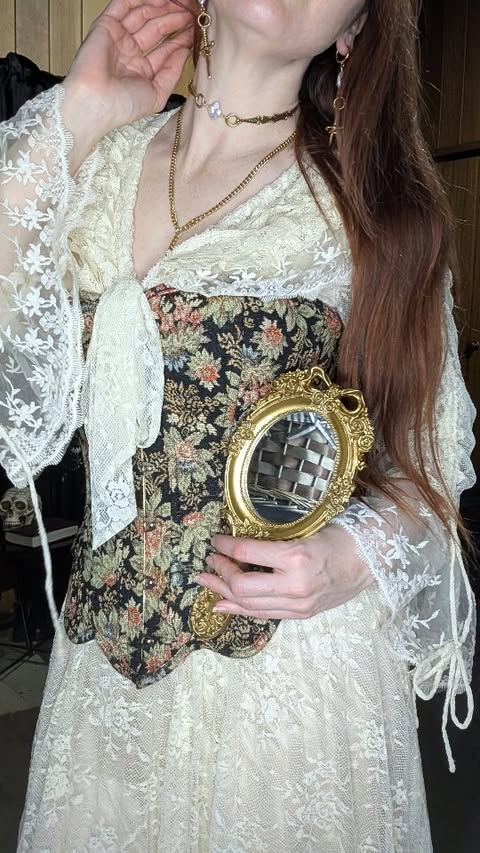 Instagram post by @thescarletthuntress for REGALROSE.com. Caption reads: Late night try on outfits with me.. which would....