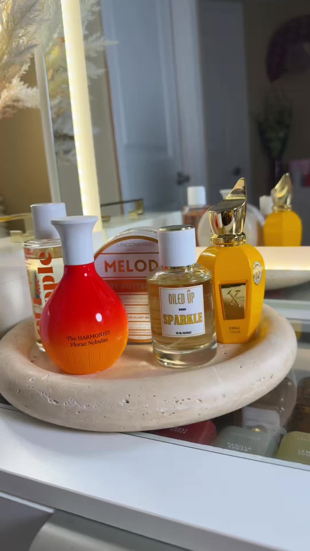 TikTok post by @tina.frag.fashion for OUI the People. Caption reads: Happy Tuesday Fam! SOTD: Body Oil @OUI the People....