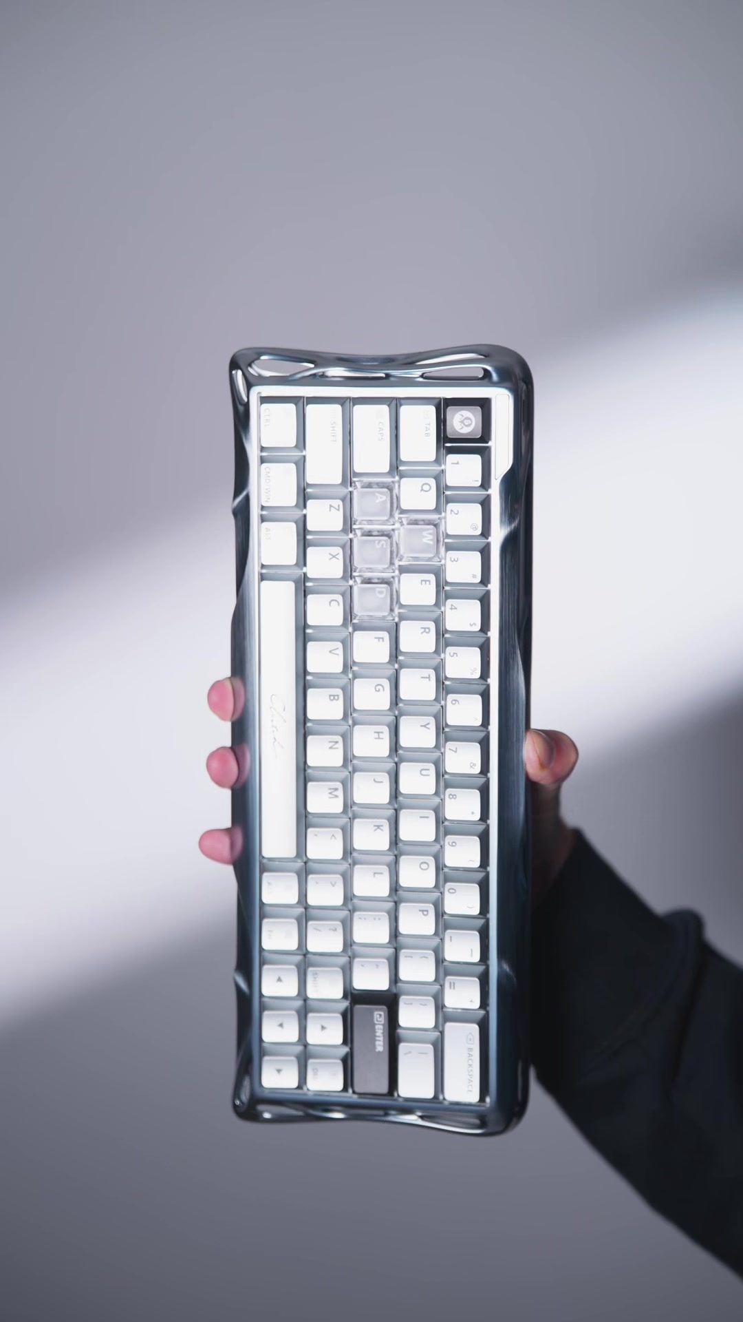 TikTok post by @ogrobbytv for GravaStar. Caption reads: Best keyboard @GravastarTikTok V60 Pro #keyboard....