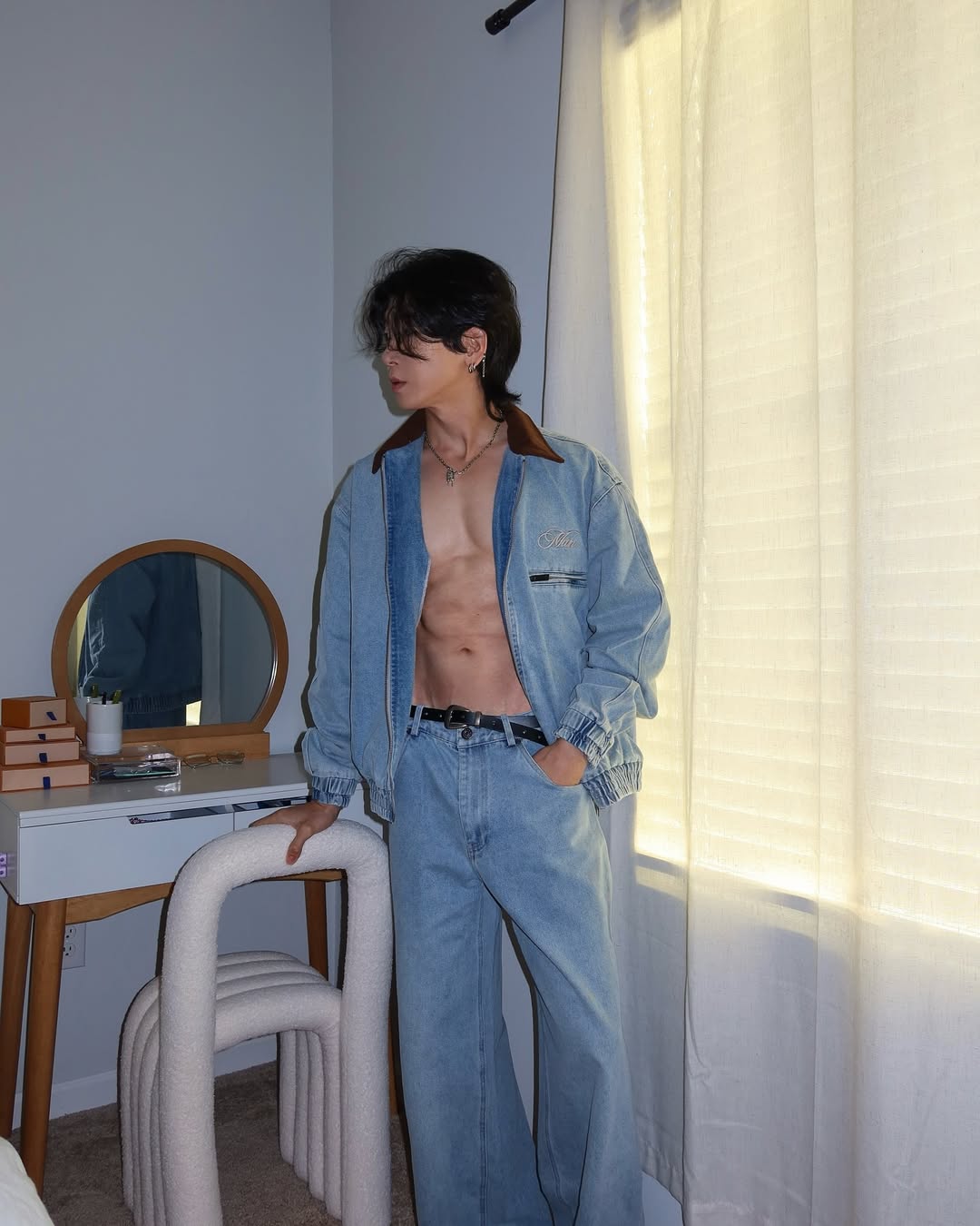 Instagram post by @_jjang.e for Boohooman. Caption reads: #ad Never too hot for a denim set 🥰
Denim set....