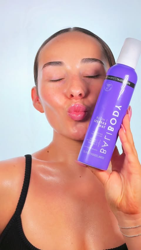 Instagram post by @caradowntonn for balibody. Caption reads: [...] 1hr express tan are truly BESTIES 😭💜....