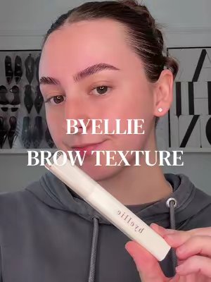 TikTok post by @klb.cosmetics for byellie. Caption reads: [...] THIS is how you get fluffy brows 👀🤎....