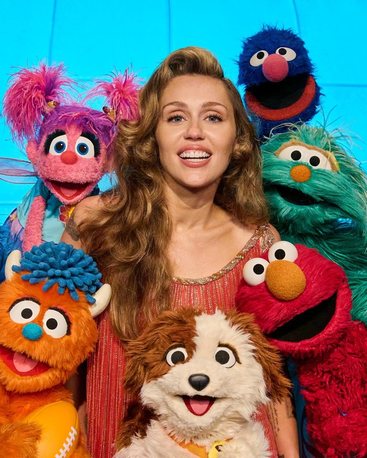 Instagram post by @mileycyrus for Sesame Street. Caption reads: Sunny days are on their way! From A to Z and....