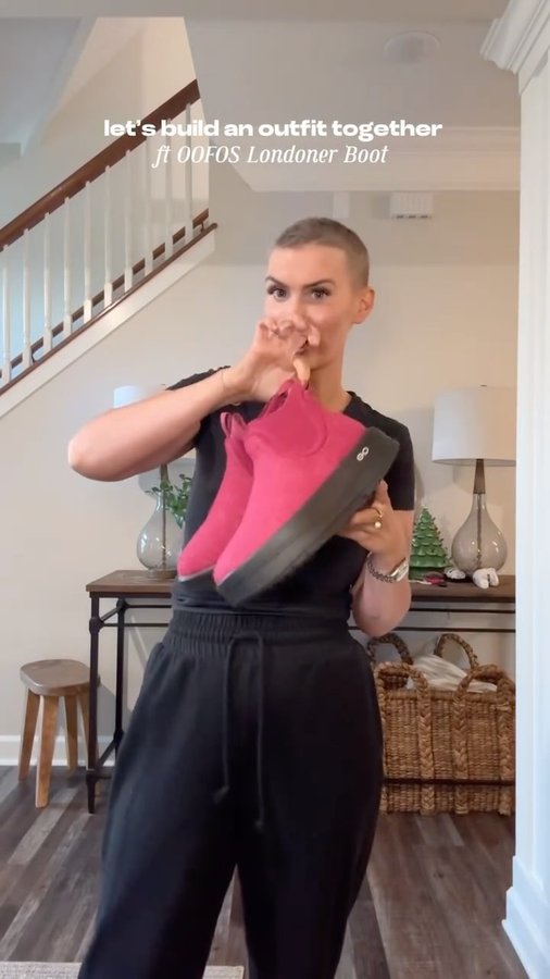 Instagram post by @tennesseewhitney for OOFOS. Caption reads: my feet love to see these @oofos boots coming.....