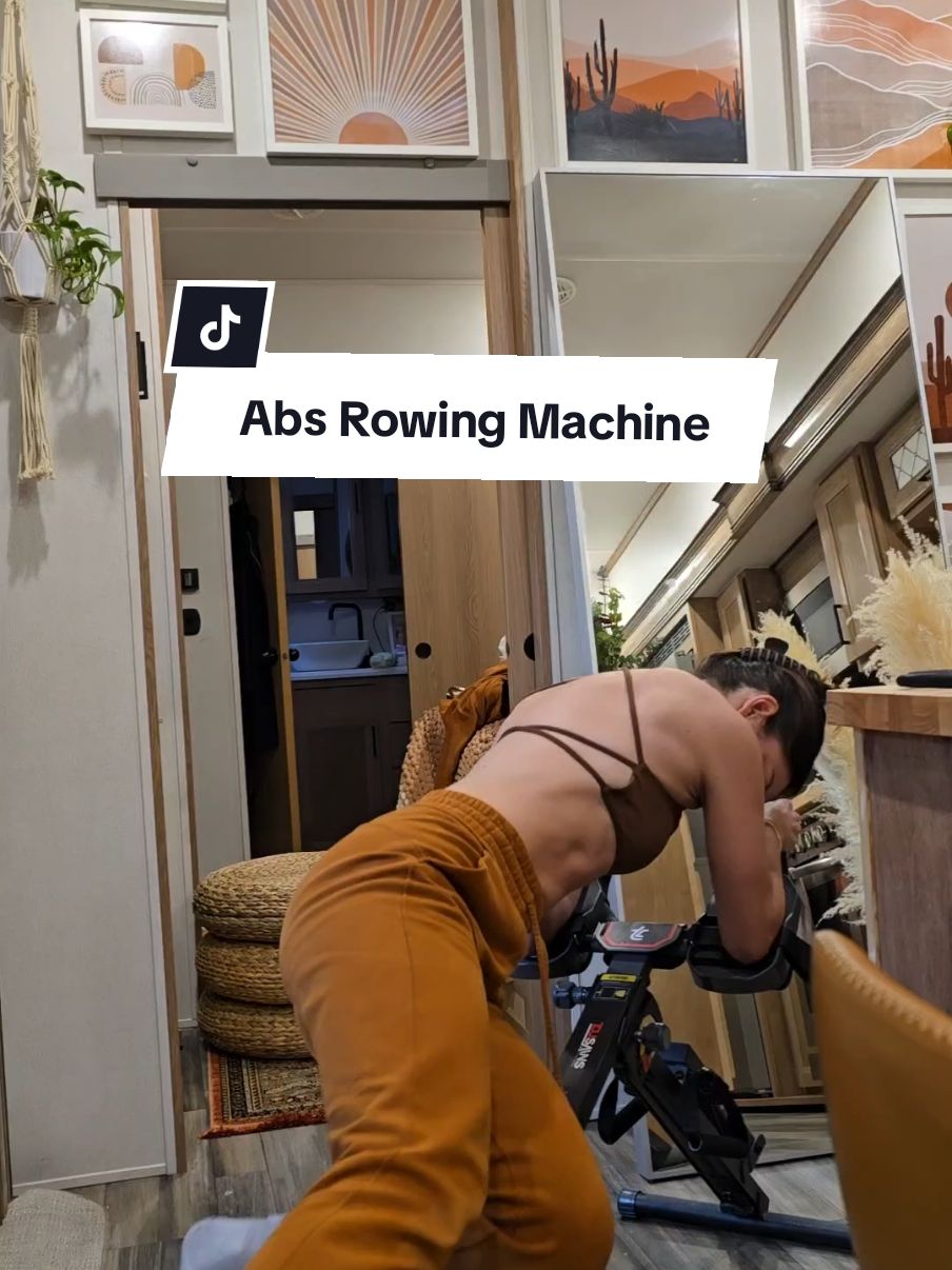 TikTok post by @the_realrebekah for TOUSAINS. Caption reads: [...] 1 rowing machine is kicking my booty.....