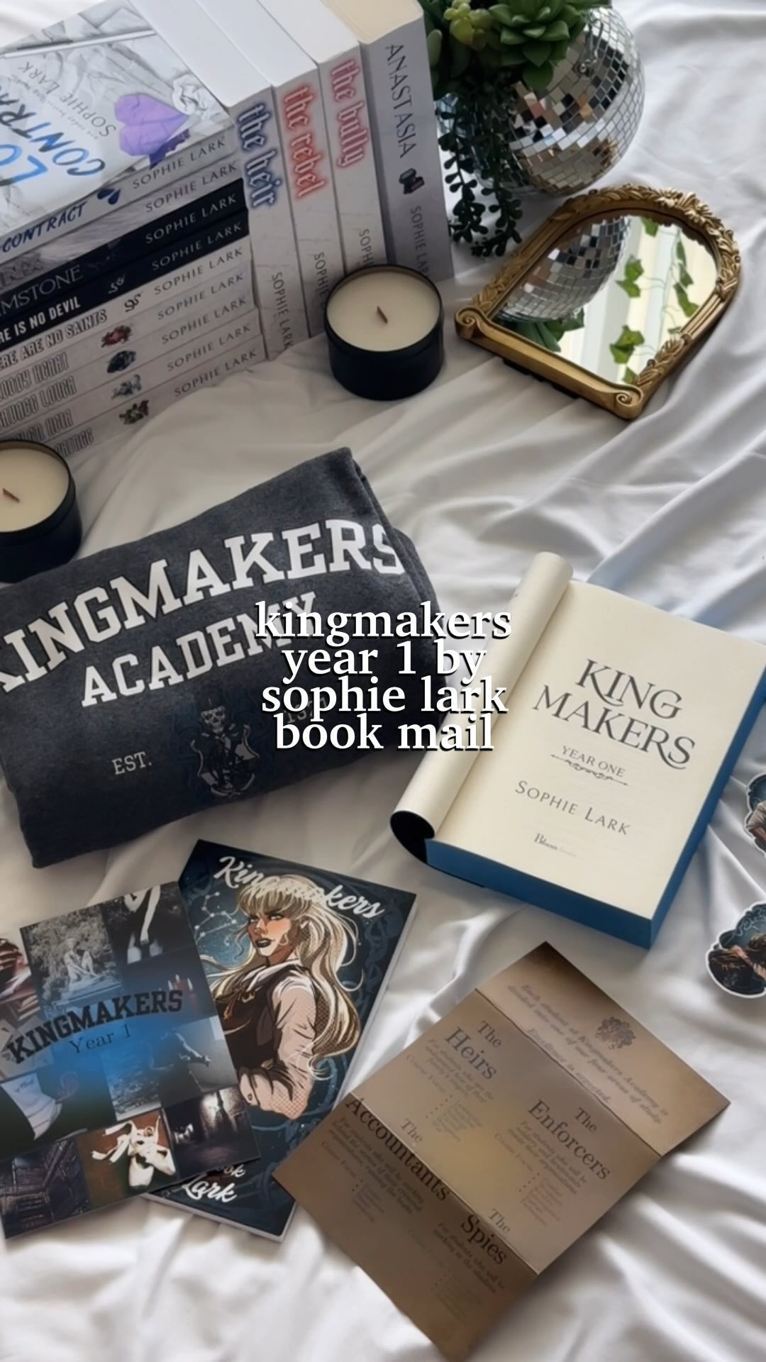 Instagram post by @drewreadss for GoodGirlsPR. Caption reads: 🤍✨ — kingmakers year 1 (the heir) bookmail —✨🍂....