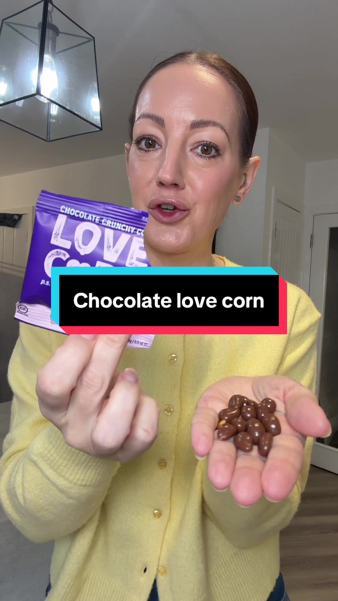 TikTok post by @carolinethecruiselady for LOVE CORN. Caption reads: Chocolate love corn is back in stock but you’ll....