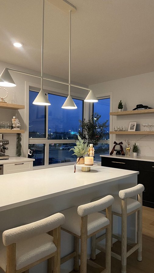 Instagram post by @gretzieparth for The Brick. Caption reads: ✨ Bringing cozy holiday vibes to our home with....