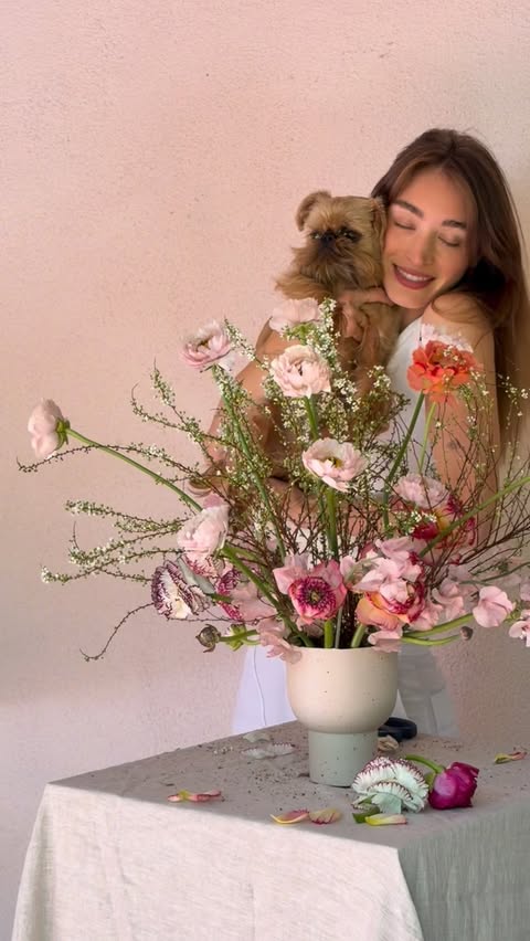 Instagram post by @audreyhilfiger for Everlane. Caption reads: Easter display in my @everlane ! 🐇🌸....