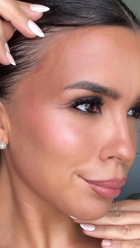 Instagram post by @beautybyizzyfitch for OGEE. Caption reads: [...] on your skin. 🤍✨ I’ve been using the OGEE....