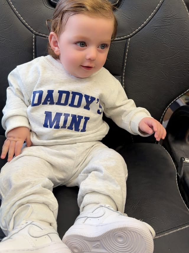 Instagram post by @romeo20flaus25 for Miniolie. Caption reads: Daddy's mini 💙🧿💎 . . Outfit from @miniolie_uk....