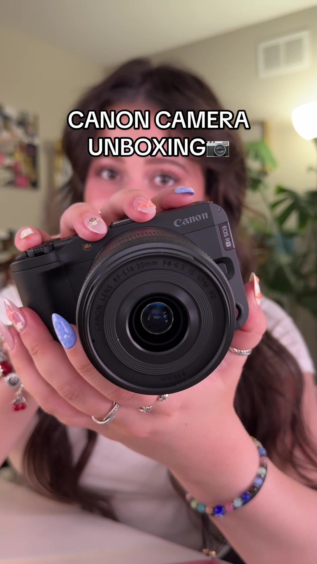 TikTok post by @heillyraices for Canon USA. Caption reads: opening my DREAM PACKAGE FROM @canonusa 📷☁️✨ (i....