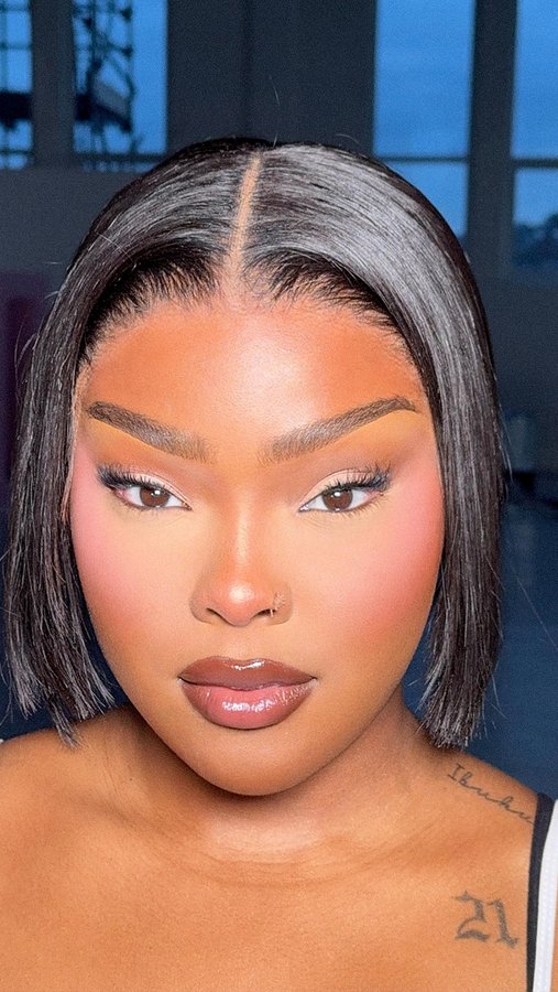 Instagram post by @sadeteniola_ for Doll Beauty. Caption reads: The most gorgeous lip combo 
Killin it lipliner....