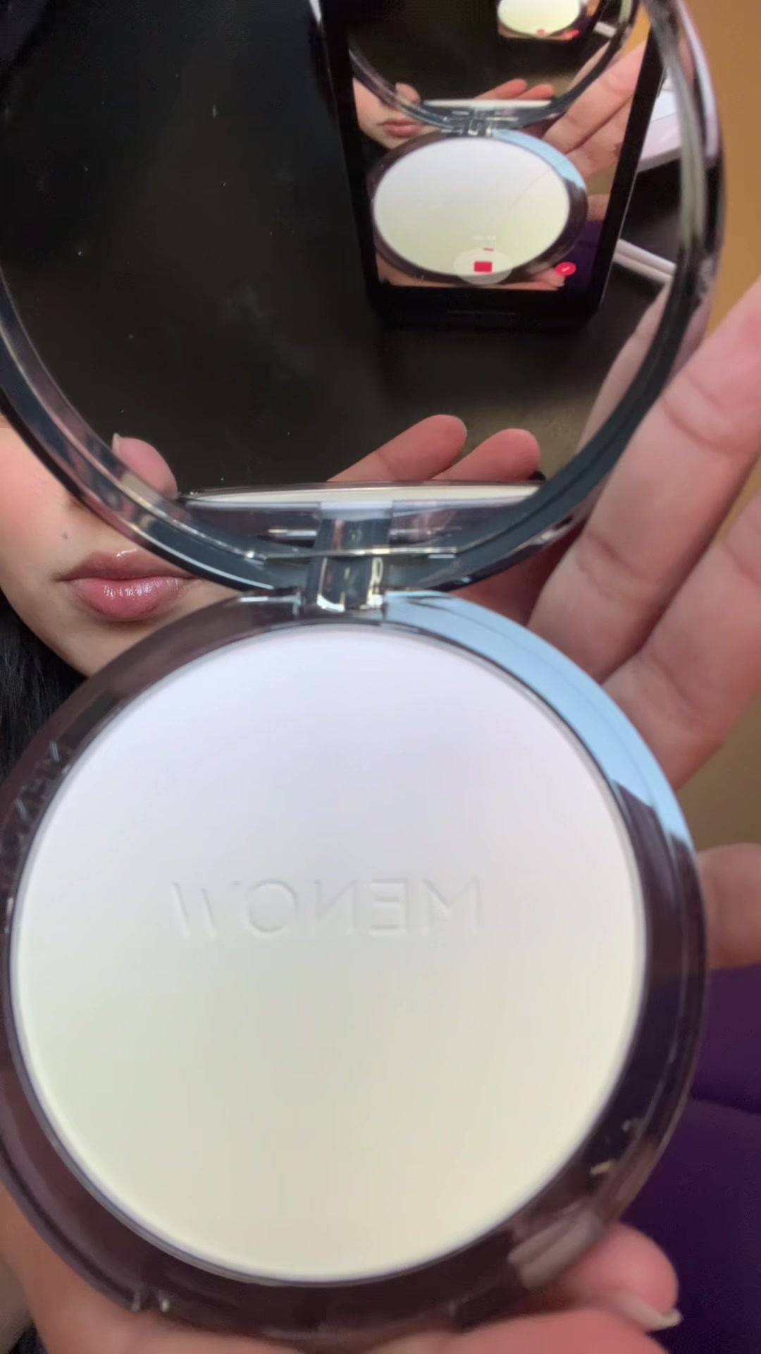 TikTok post by @em31lyy for Menow. Caption reads: #menow #powder #makeup @MENOW US 🌸.