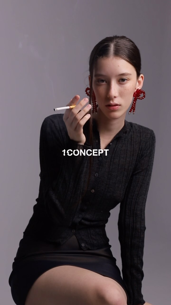 Instagram post by @1concept.world for Ford Models. Caption reads: 🚬🍸💋Happy New Year from....