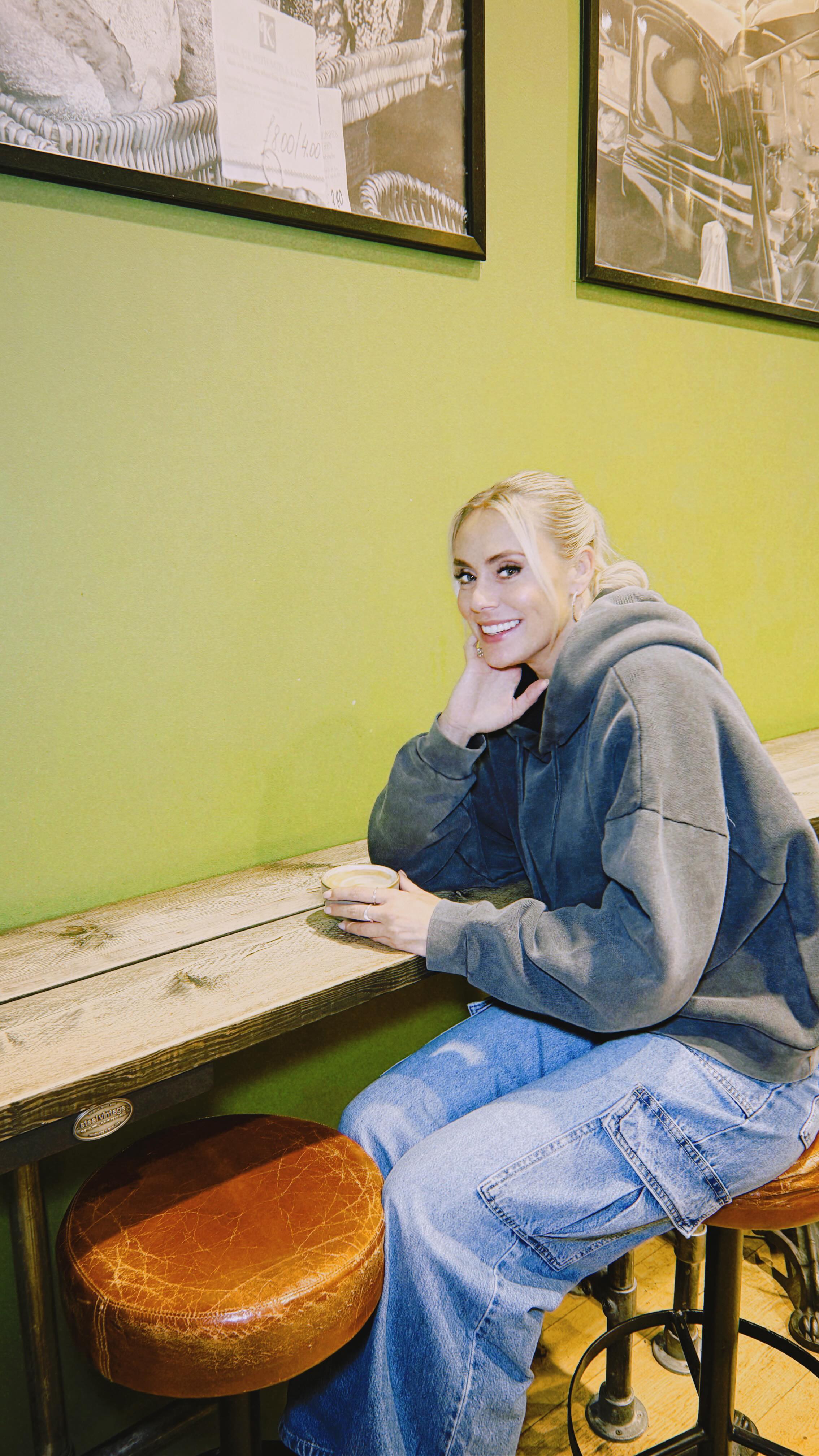 Instagram post by @missemmapaton for Lavazza. Caption reads: [...] run to a busy day in the studio, my new....