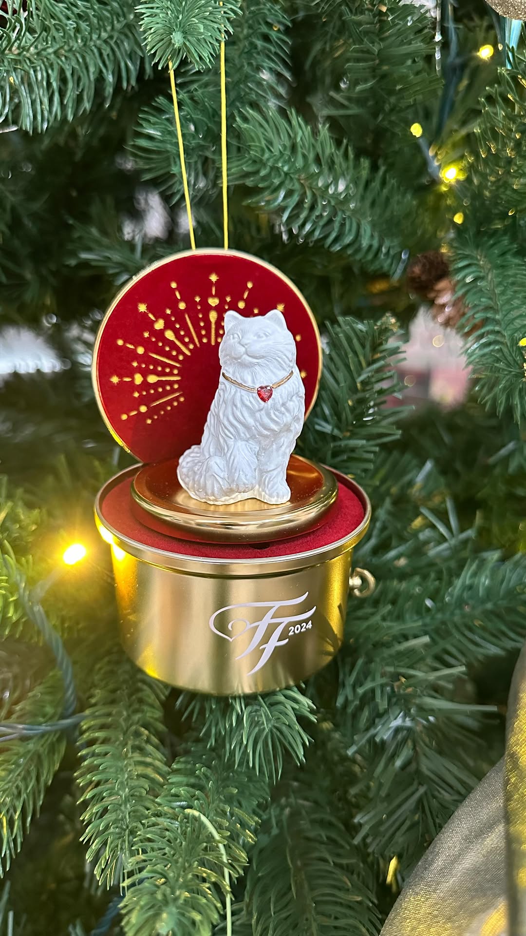 Instagram post by @penguinpepperpia for Fancy Feast. Caption reads: The start of my annual fancy feast ornament....