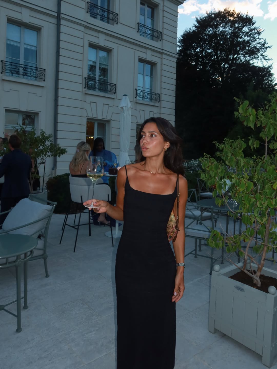 Instagram post by @anitadacosta for Moët & Chandon. Caption reads: She’s wearing the little black dress but drinking....