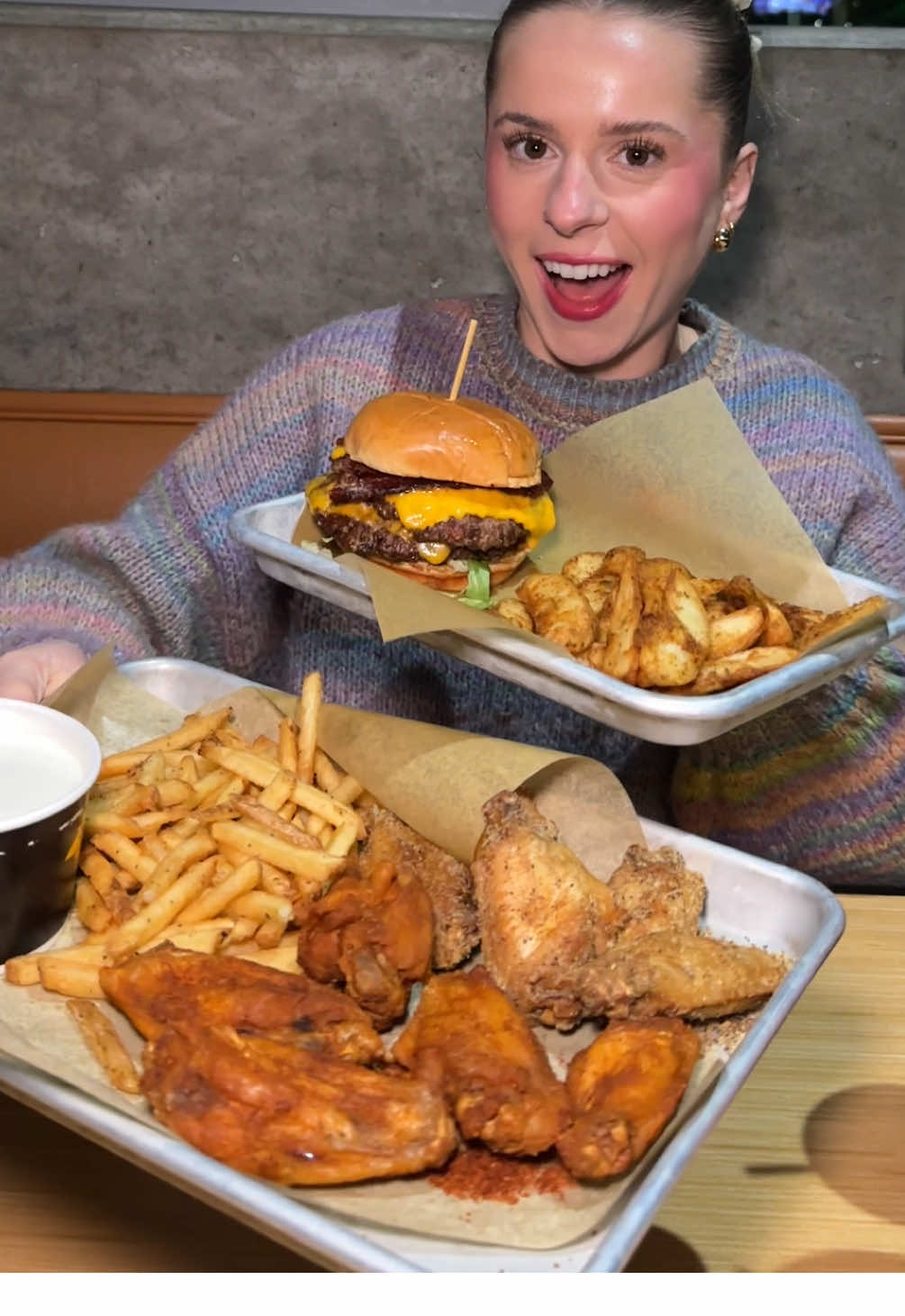 TikTok post by @daseycaviseats for Buffalo Wild Wings. Caption reads: [...] starting at  $19.99 is ELITE @Buffalo Wild....