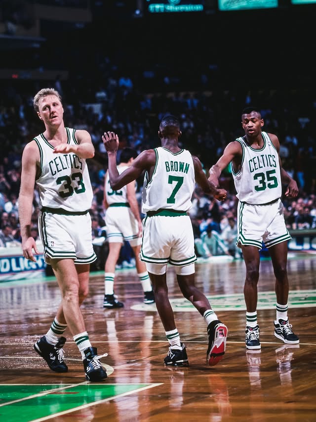 Instagram post by @deebrown_og for Xfinity. Caption reads: "There's no division banners in Boston."⁣
⁣
Red....