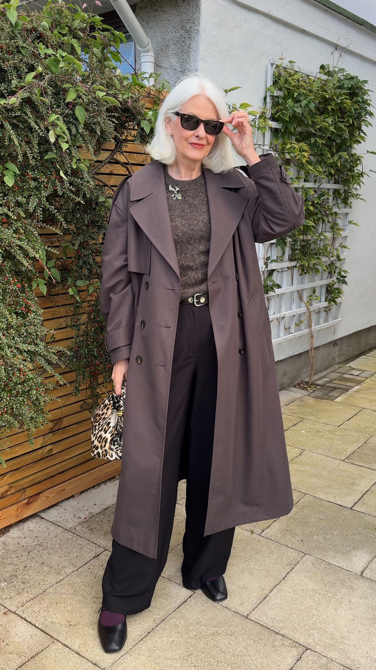 Instagram post by @embracingfifty for Massimo Dutti. Caption reads: #grwm A short sleeve knit is ideal for the....