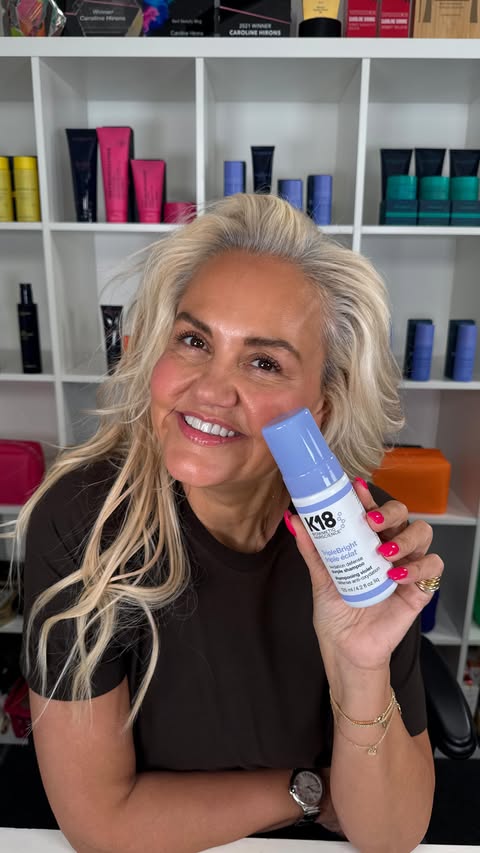 Instagram post by @carolinehirons for K18 Hair. Caption reads: [...] your colour and pushing it brassy.....