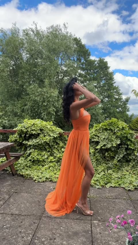 Instagram post by @sureetkular for Bella Barnett. Caption reads: Nobody needs a reason to feel this good 🧡 Orange....