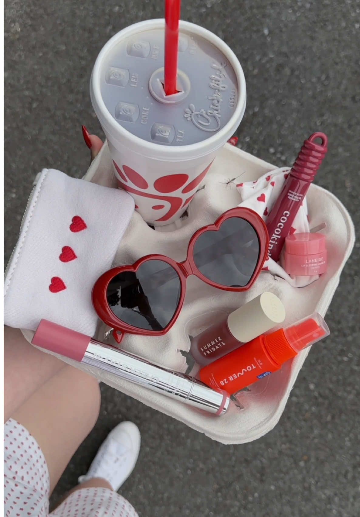 TikTok post by @wellermegs for Chick-fil-A. Caption reads: [...] grant summer essentials 🫶🏻💋 💋....