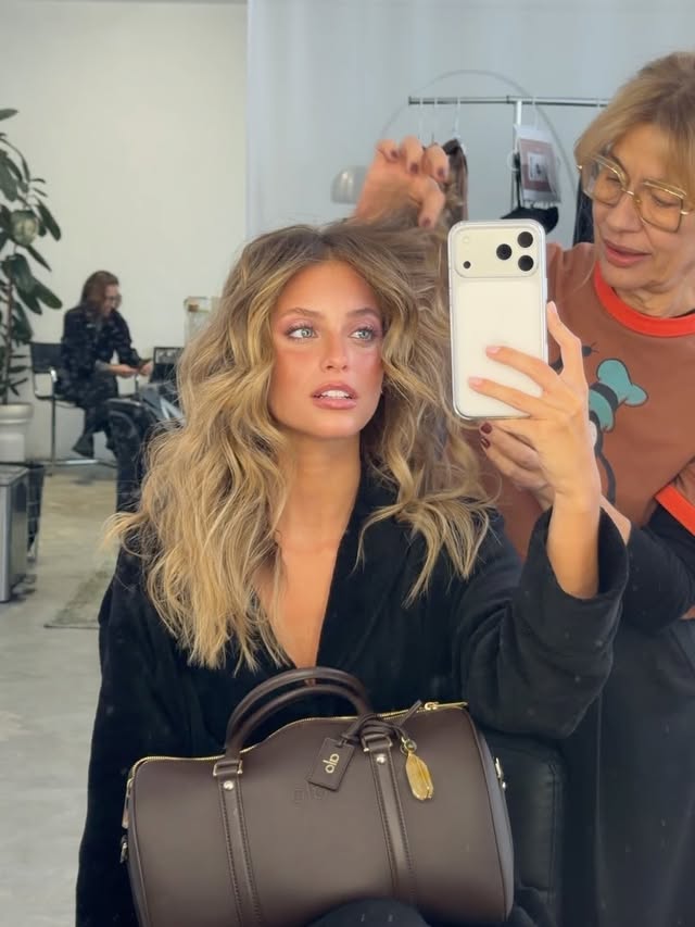 Instagram post by @magui_corceiro for Alo Yoga. Caption reads: back to work and maybe a little too obsessed with....