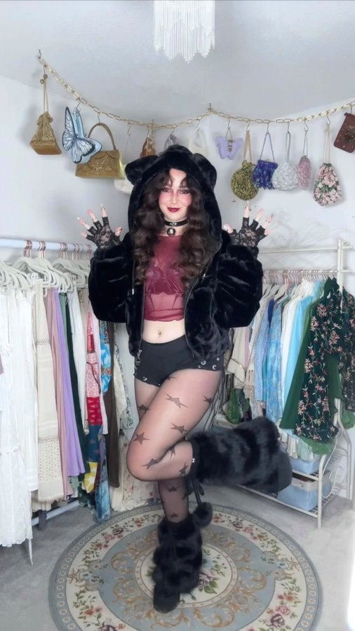 Instagram post by @k.aila.n for Minga London. Caption reads: styling a black cat halloween outfit 🐈‍⬛🖤 super....