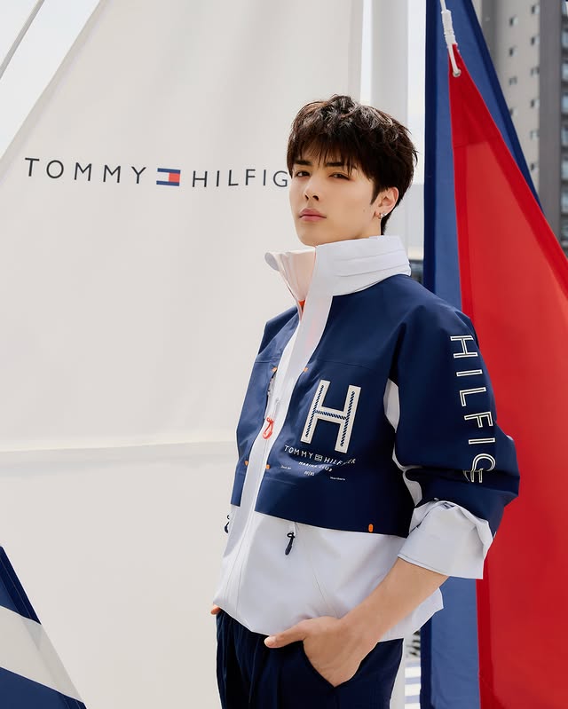 Instagram post by @andteam_official for Tommy Hilfiger. Caption reads: Tommy Hilfiger Summer 2026. ⛵ Celebrating the....