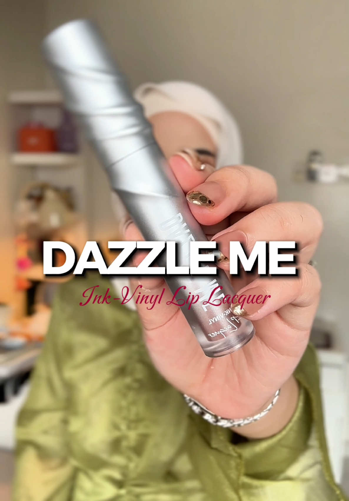 TikTok post by @najjiiiha for DAZZLE ME Malaysia. Caption reads: Lip Swatches of @DAZZLE ME MALAYSIA ink vinyl! 💋....