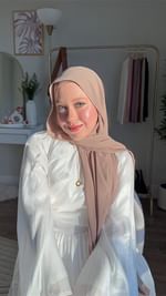 Instagram post by @hadeer_mohiey for NYVA. Caption reads: [...] and easy? 
Loving the instant hijab from....