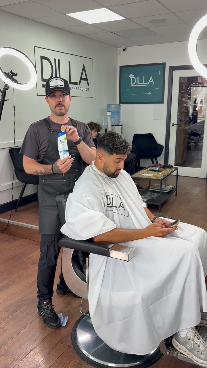 Instagram post by @thisisfg_ for Head & Shoulders. Caption reads: Making my clients flake free 🤣🙌🏼.