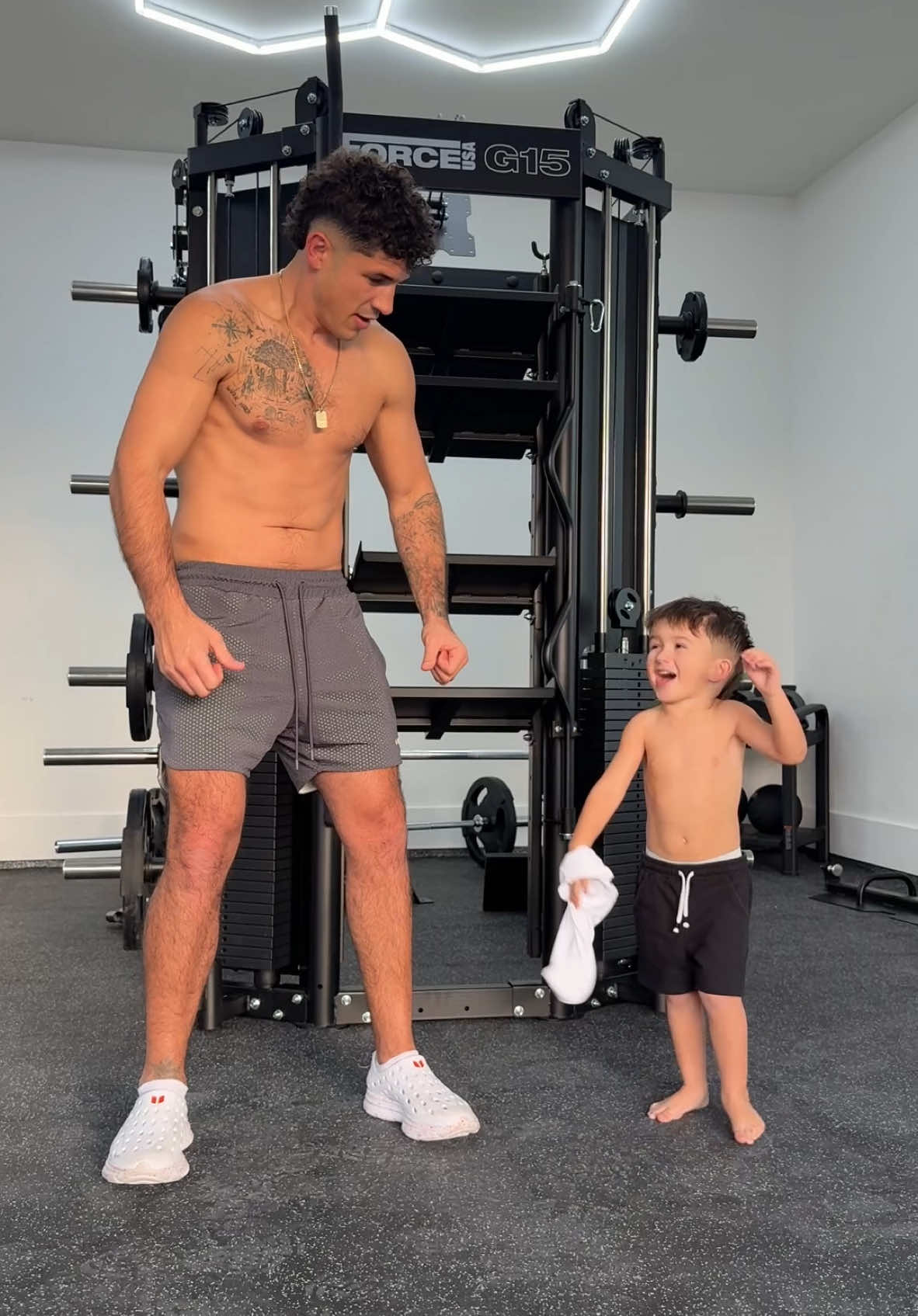 TikTok post by @babyfaceniko for SmartyPants Vitamins. Caption reads: Idk what Neo loves more working out or his....