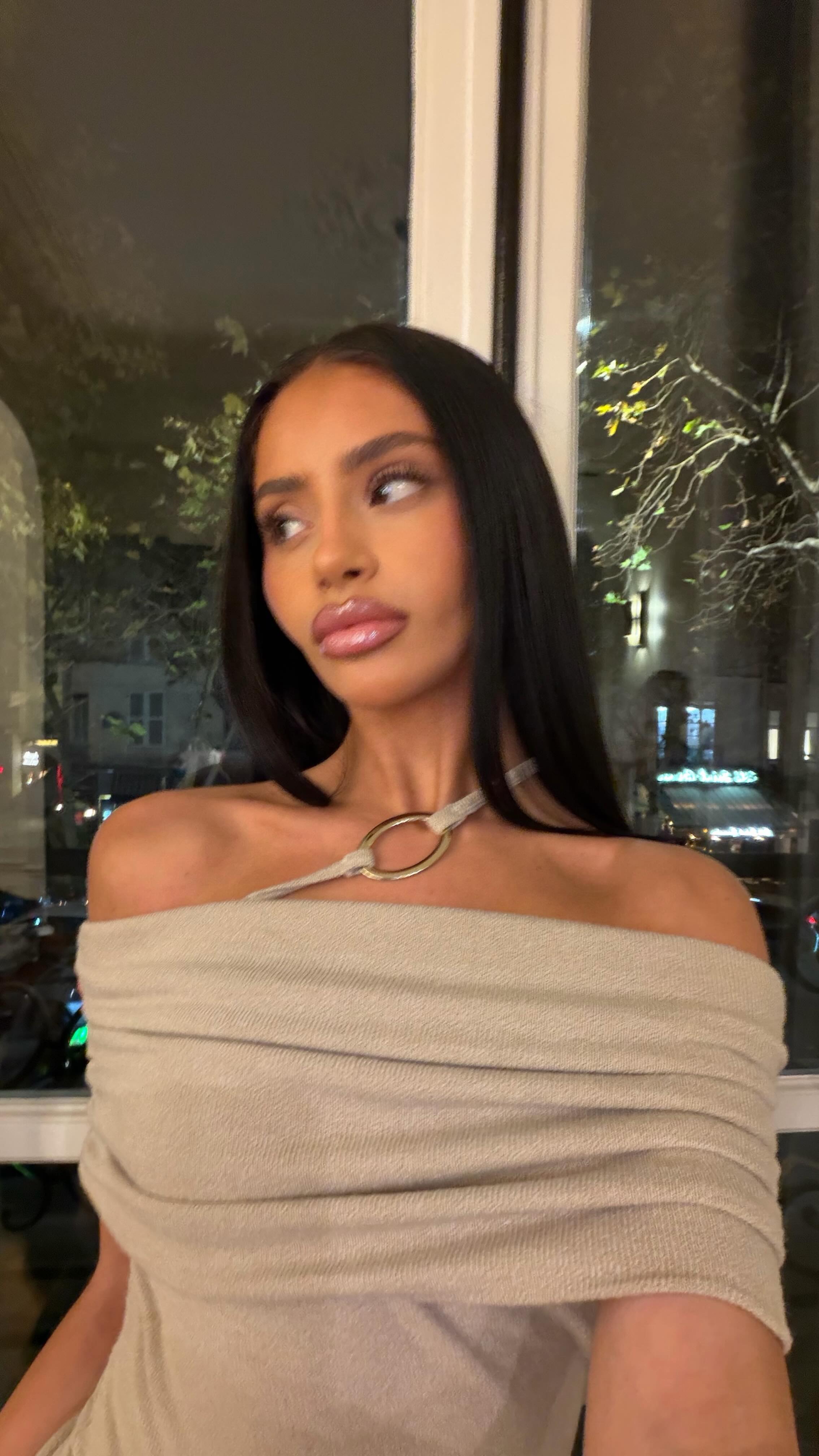 Instagram post by @anyarebke for Kylie Cosmetics. Caption reads: 🫦.